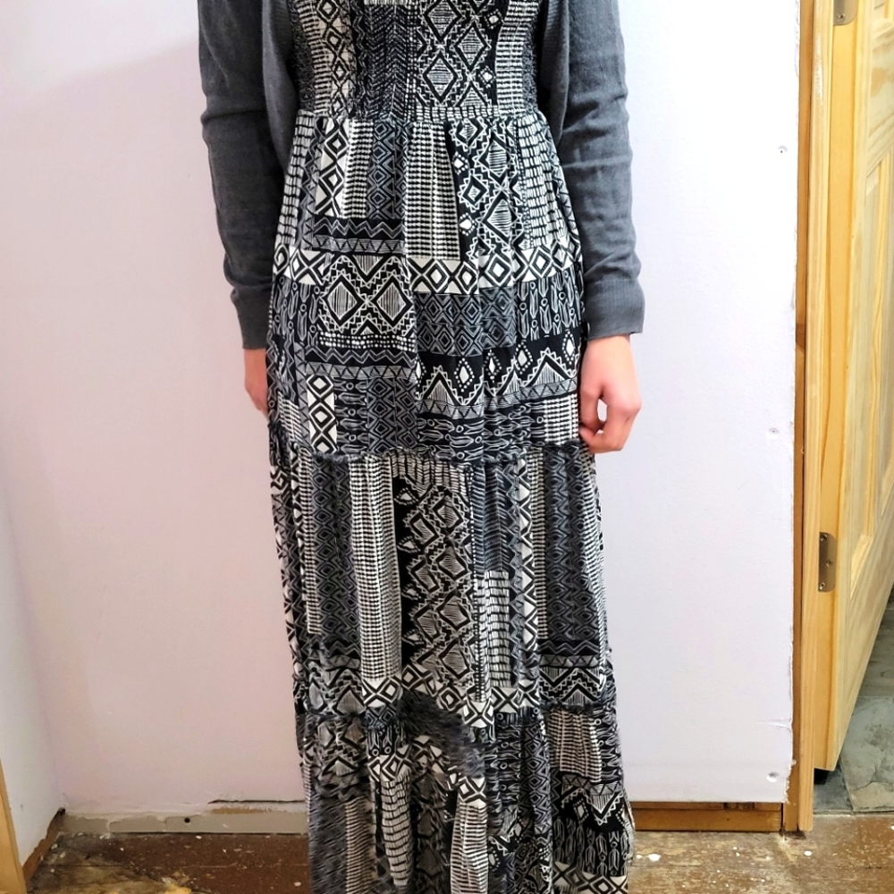 Black and white maxi dress with spaghetti straps.  100 percent rayon. Size S